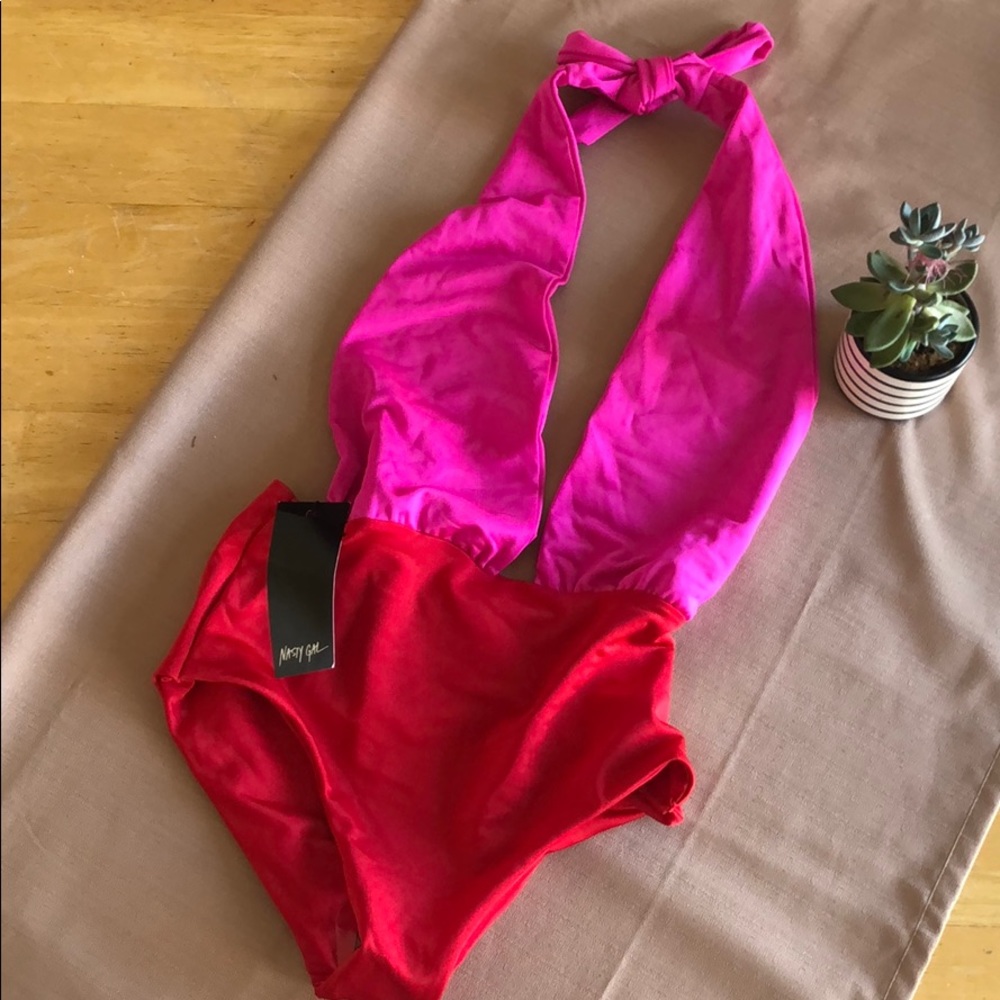 One piece, open back, halter bathing suit.